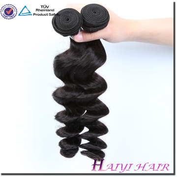 Qingdao Haiyi Hair Products Co. Cabello peruano suelto ondulado Remy Hair